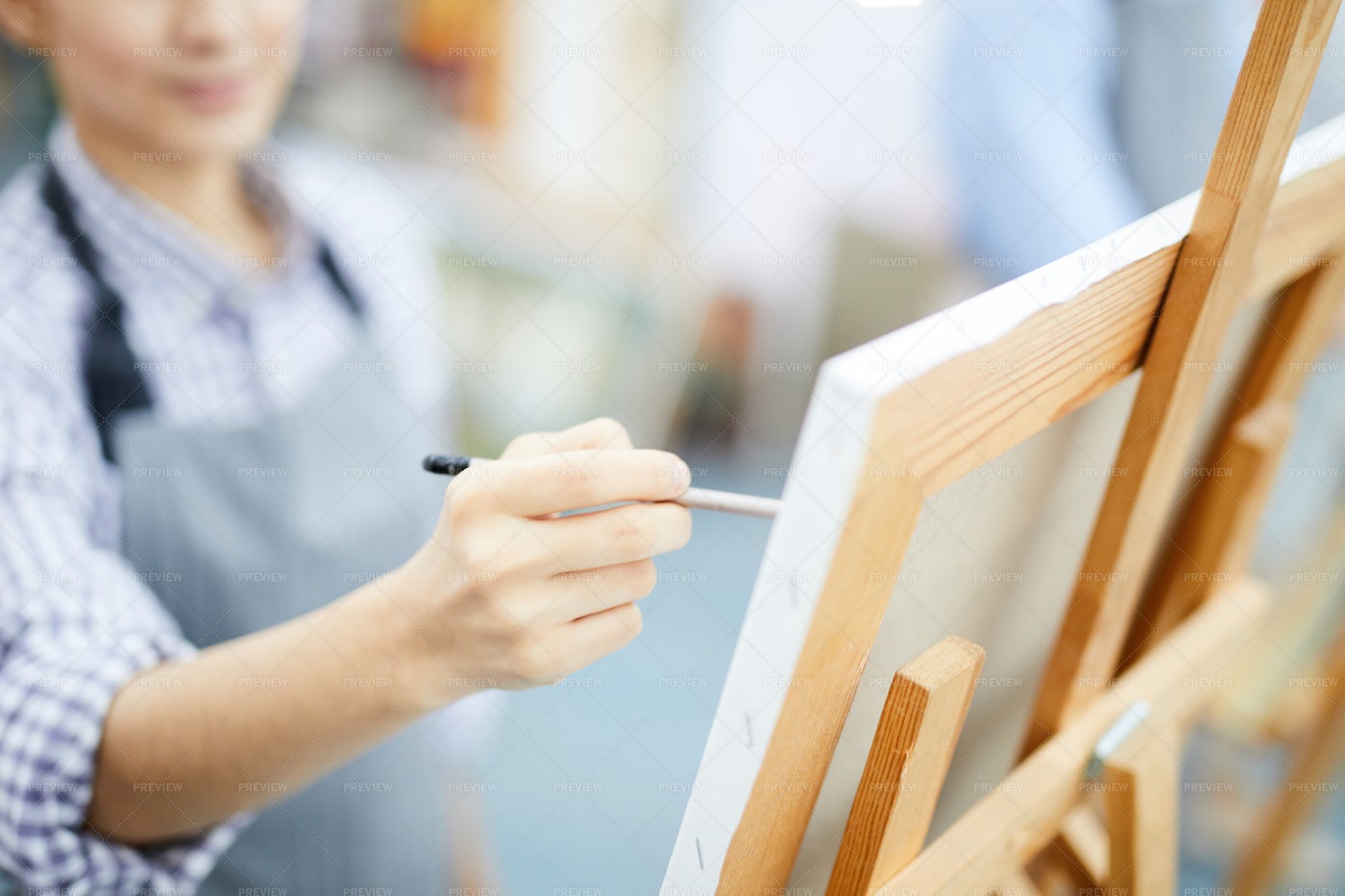 Artist Painting On Easel: Stock Photos