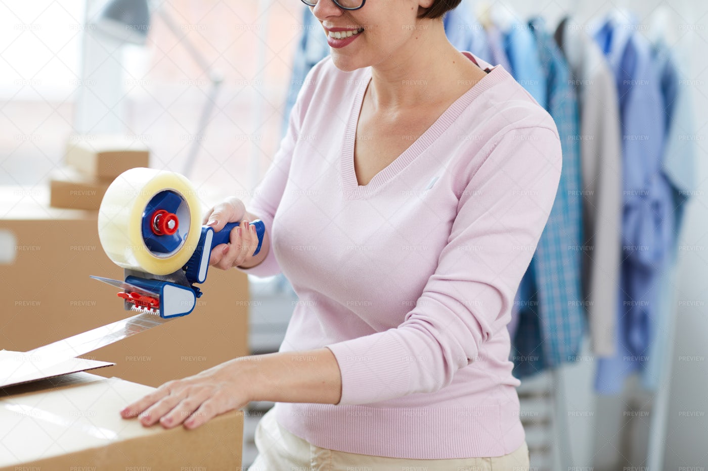 Young Manager With Packaging Tape...: Stock Photos