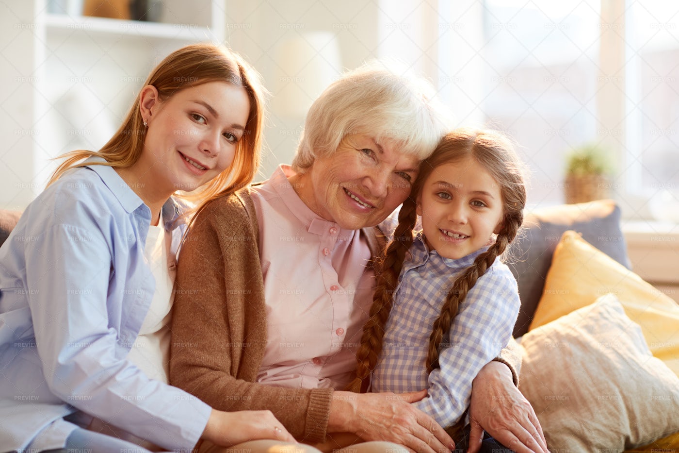 Grandmother Posing With Family: Stock Photos