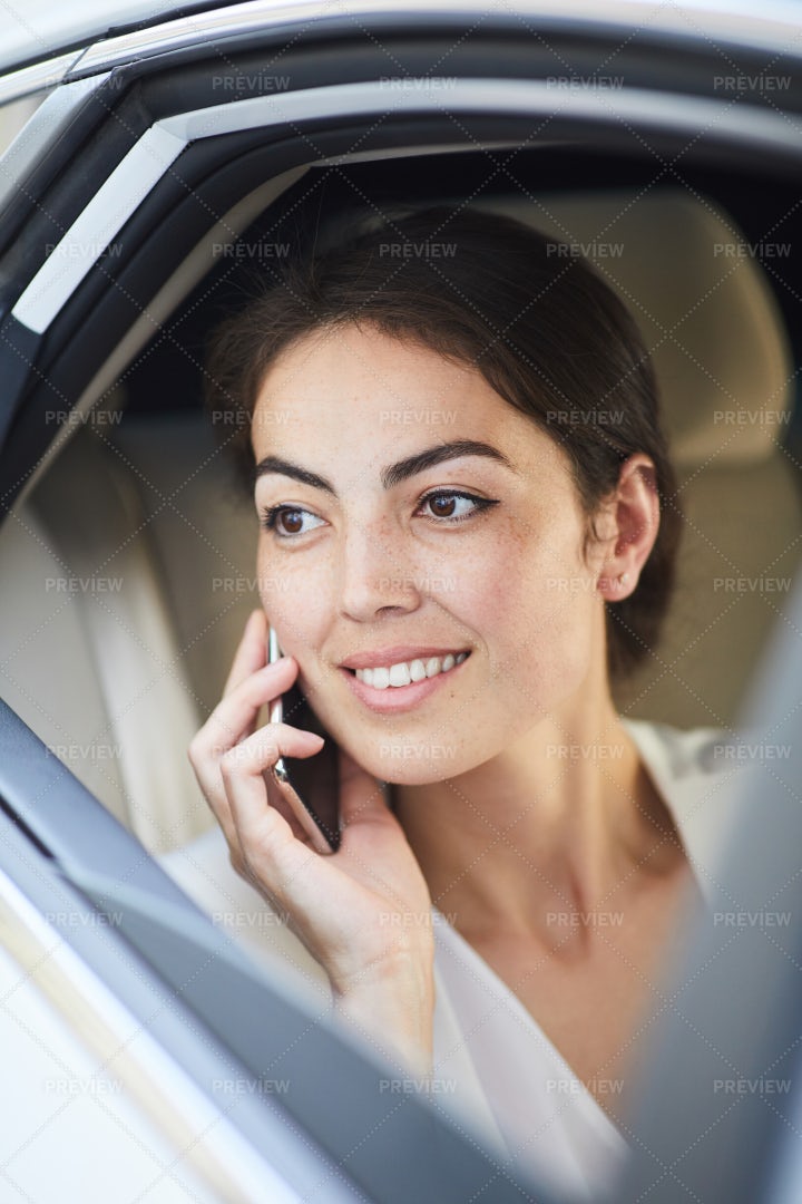 Young Woman Calling From Taxi: Stock Photos