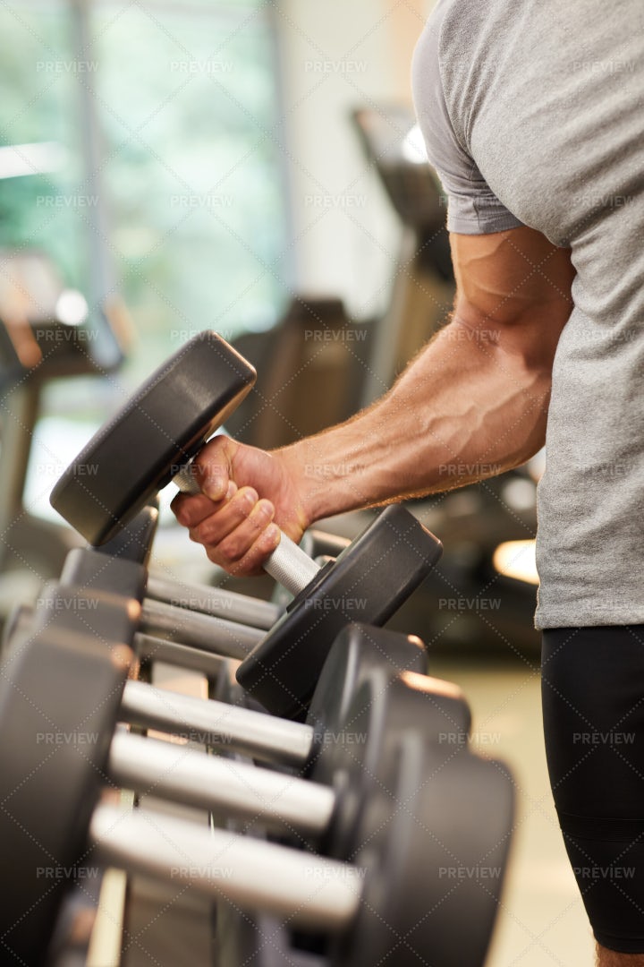 Strong Man Holding Dumbbell: Stock Photos