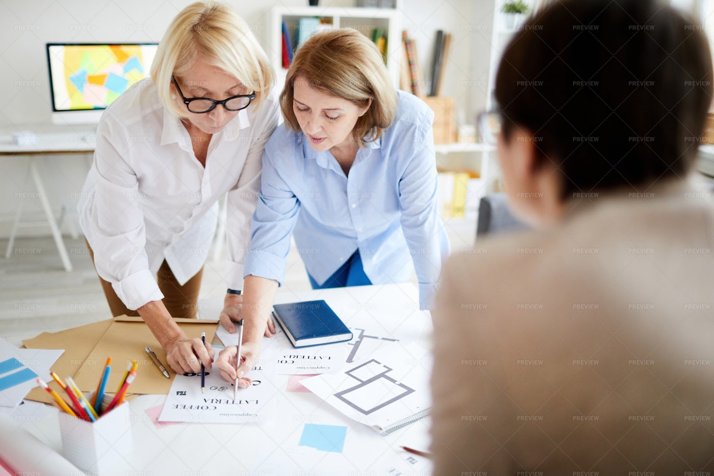 Female Designers Collaborating: Stock Photos