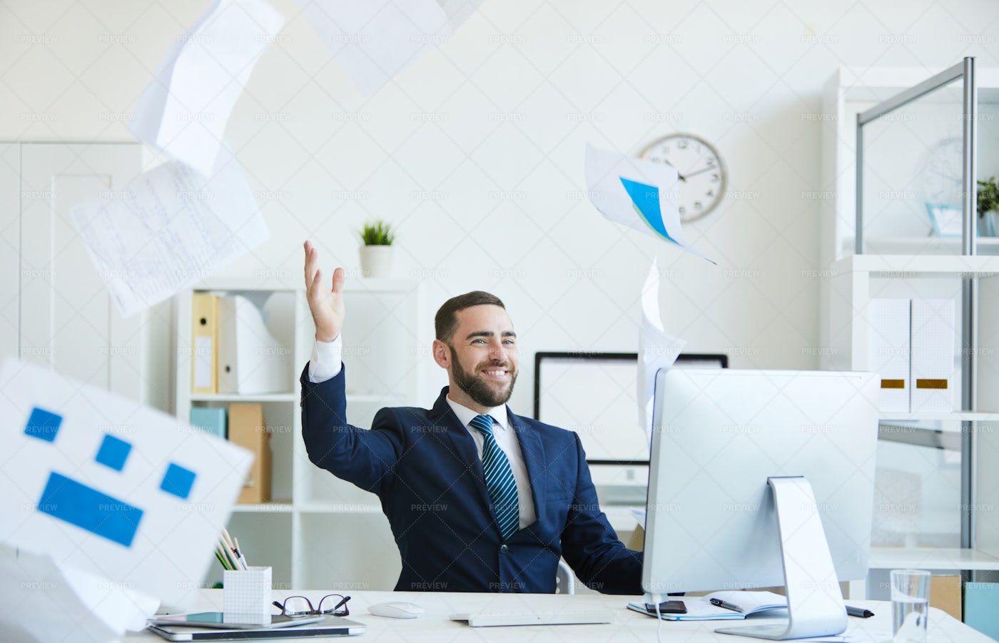 Carefree Office Employee Throwing...: Stock Photos