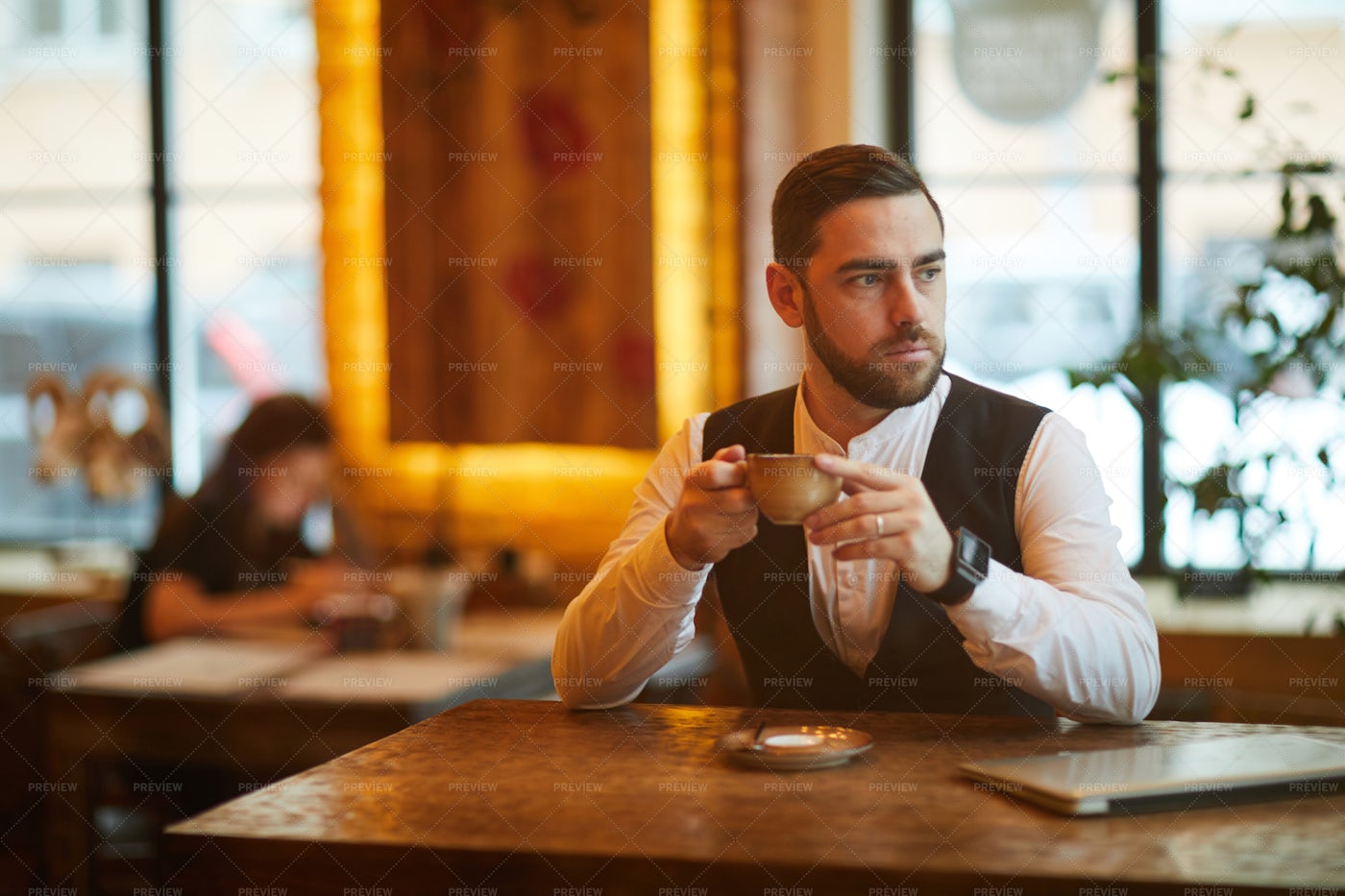 Businessman In Cafe On Coffee Break: Stock Photos
