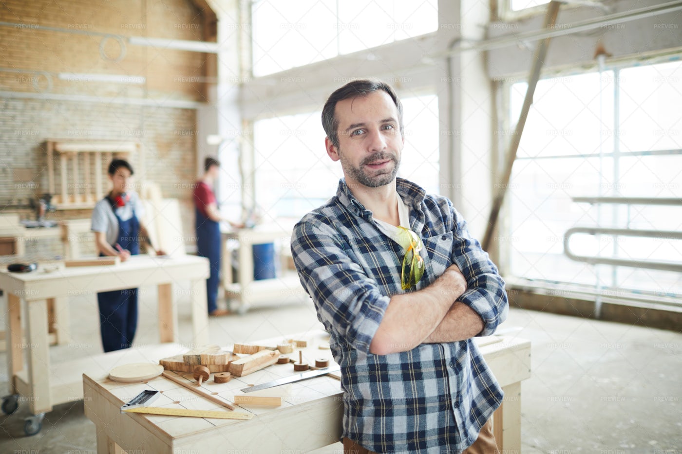 Confident Workman In Carpentry Shop: Stock Photos