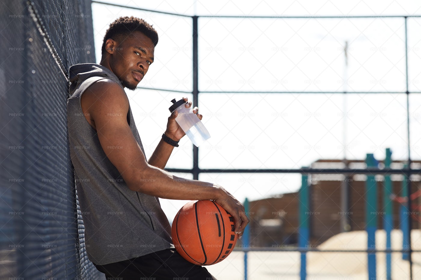 Basketball Player Drinking Water: Stock Photos