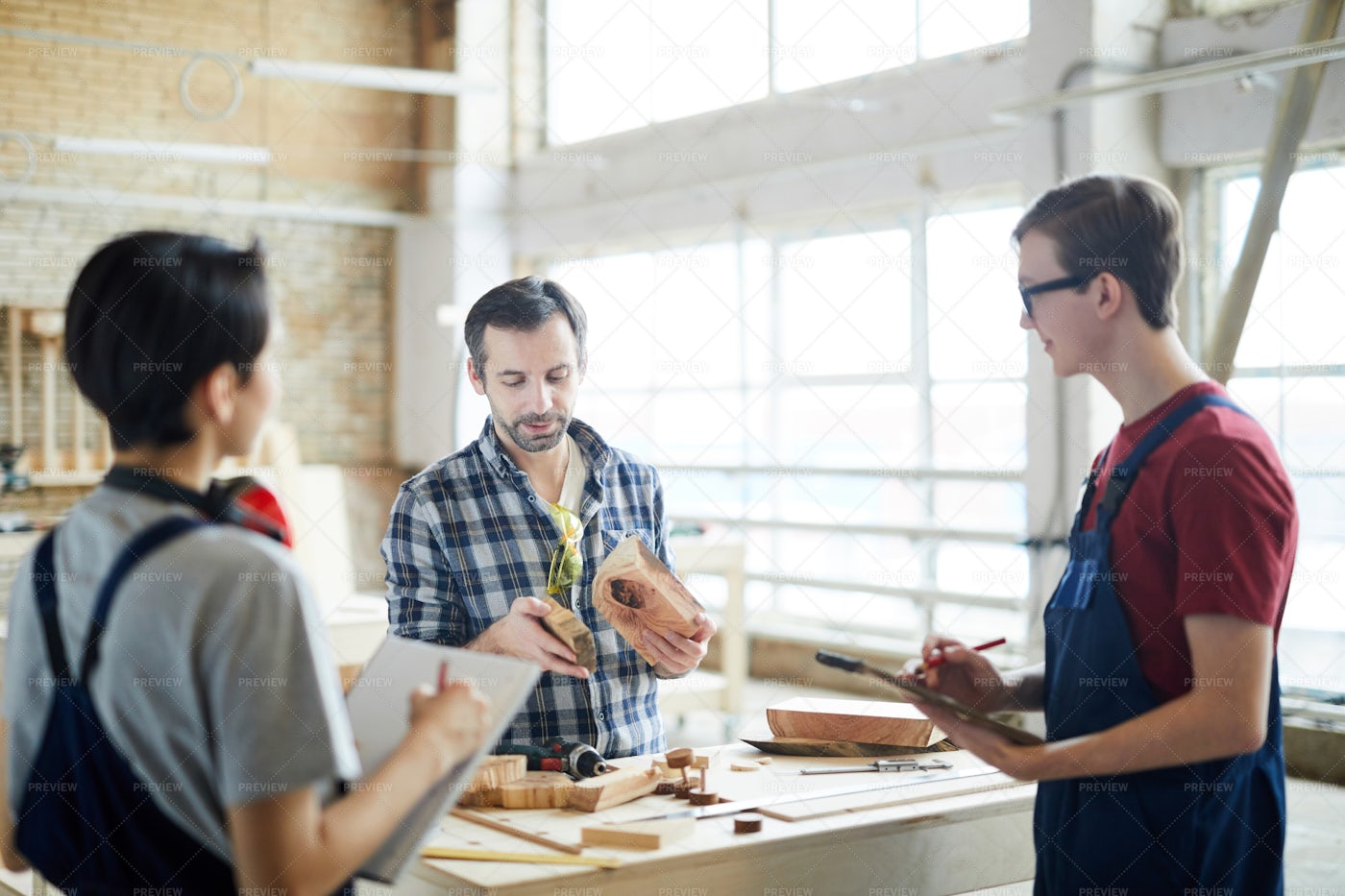 Skilled Carpenter Holding Class For...: Stock Photos