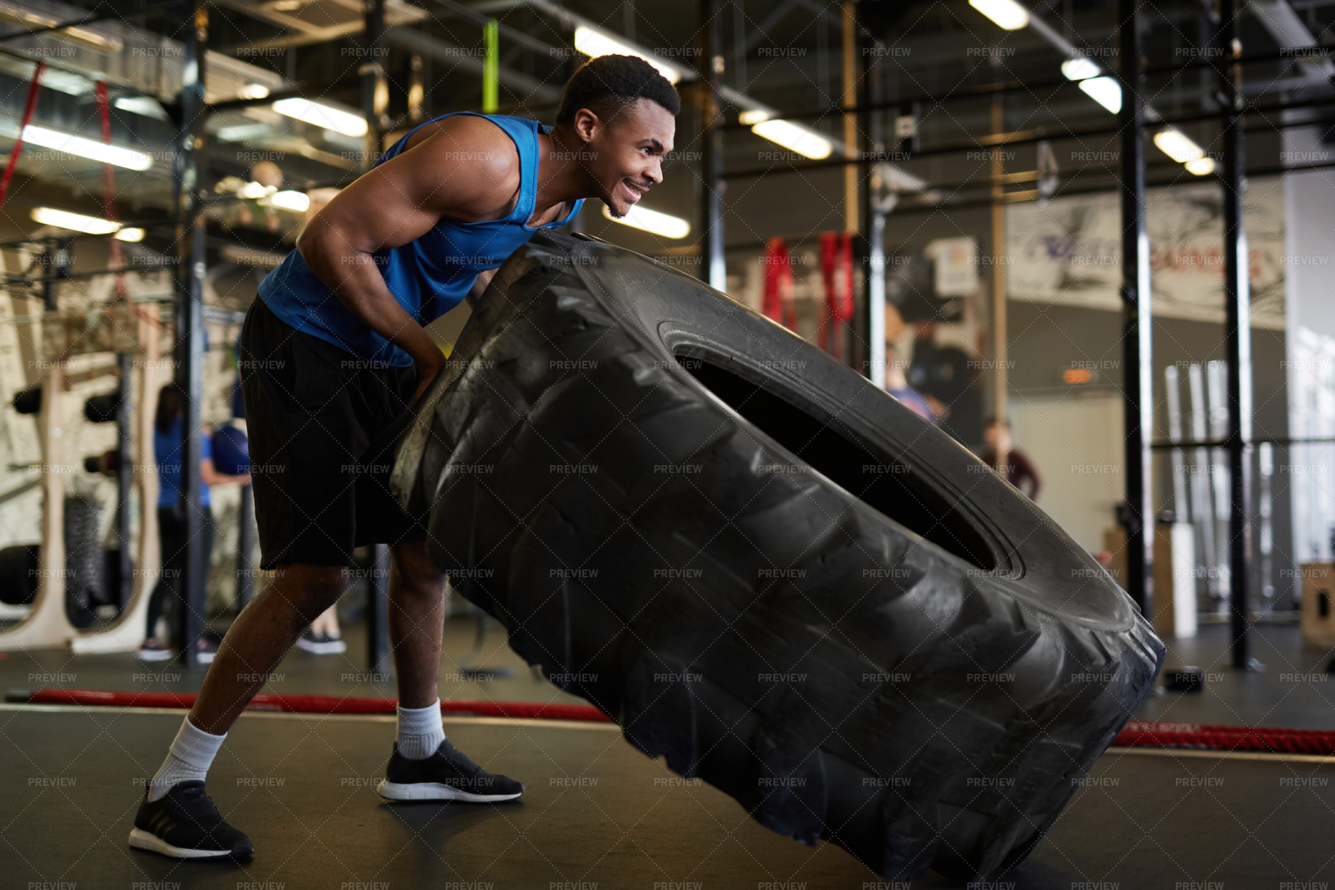 Strong Man Flipping Tire In Gym Stock Photos Motion Array