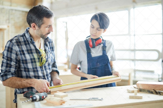 Carpenters Checking Measurement - Stock Photos | Motion Array