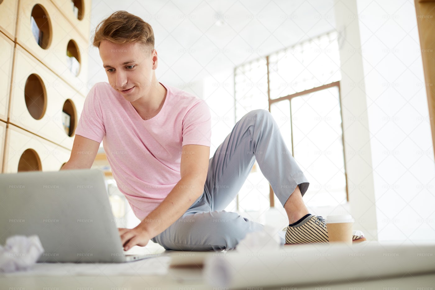 Student Guy Using Laptop In Library: Stock Photos