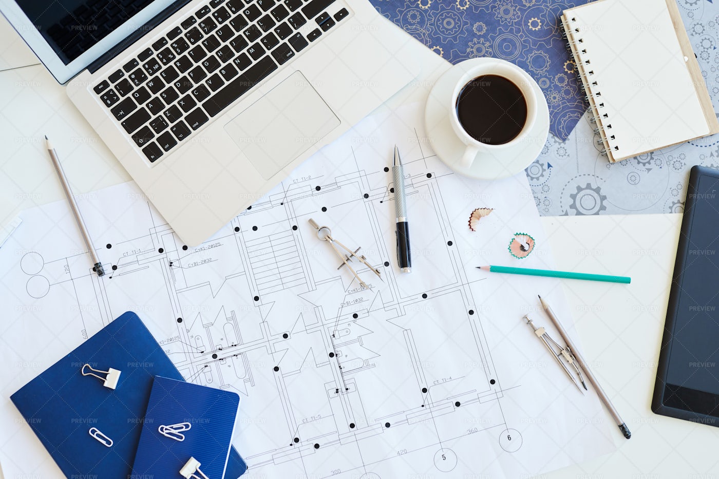 Housing Plan Blueprint On Desk: Stock Photos