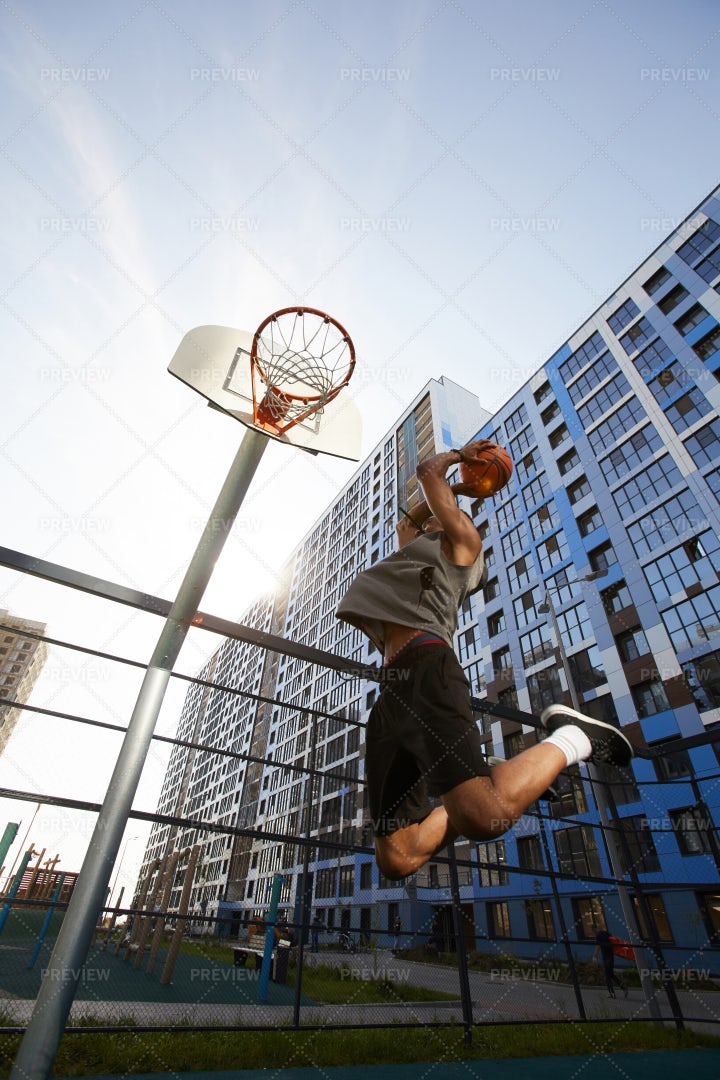 Basketball Player Dunks: Stock Photos