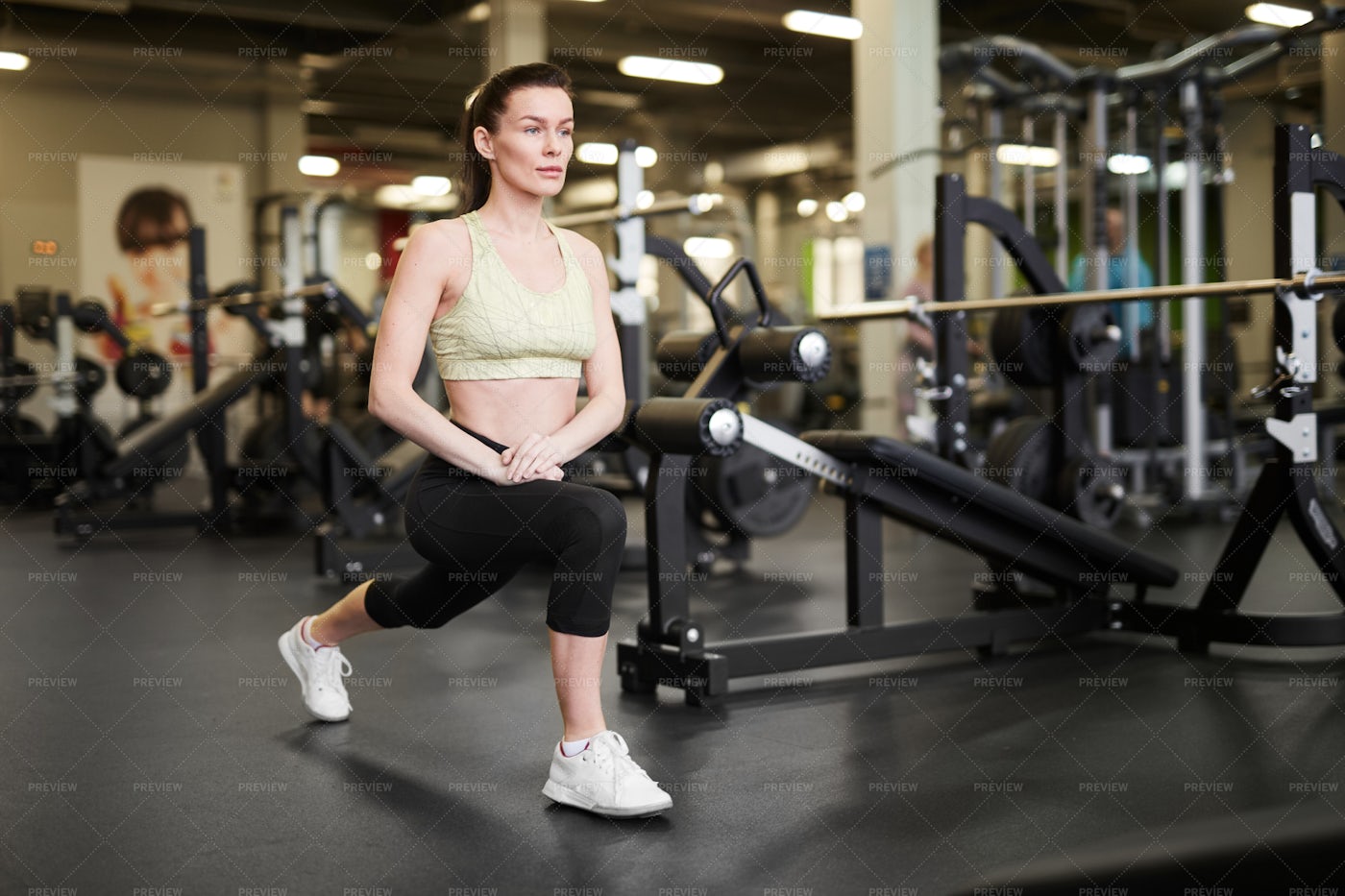 Sportswoman Stretching In Gym: Stock Photos