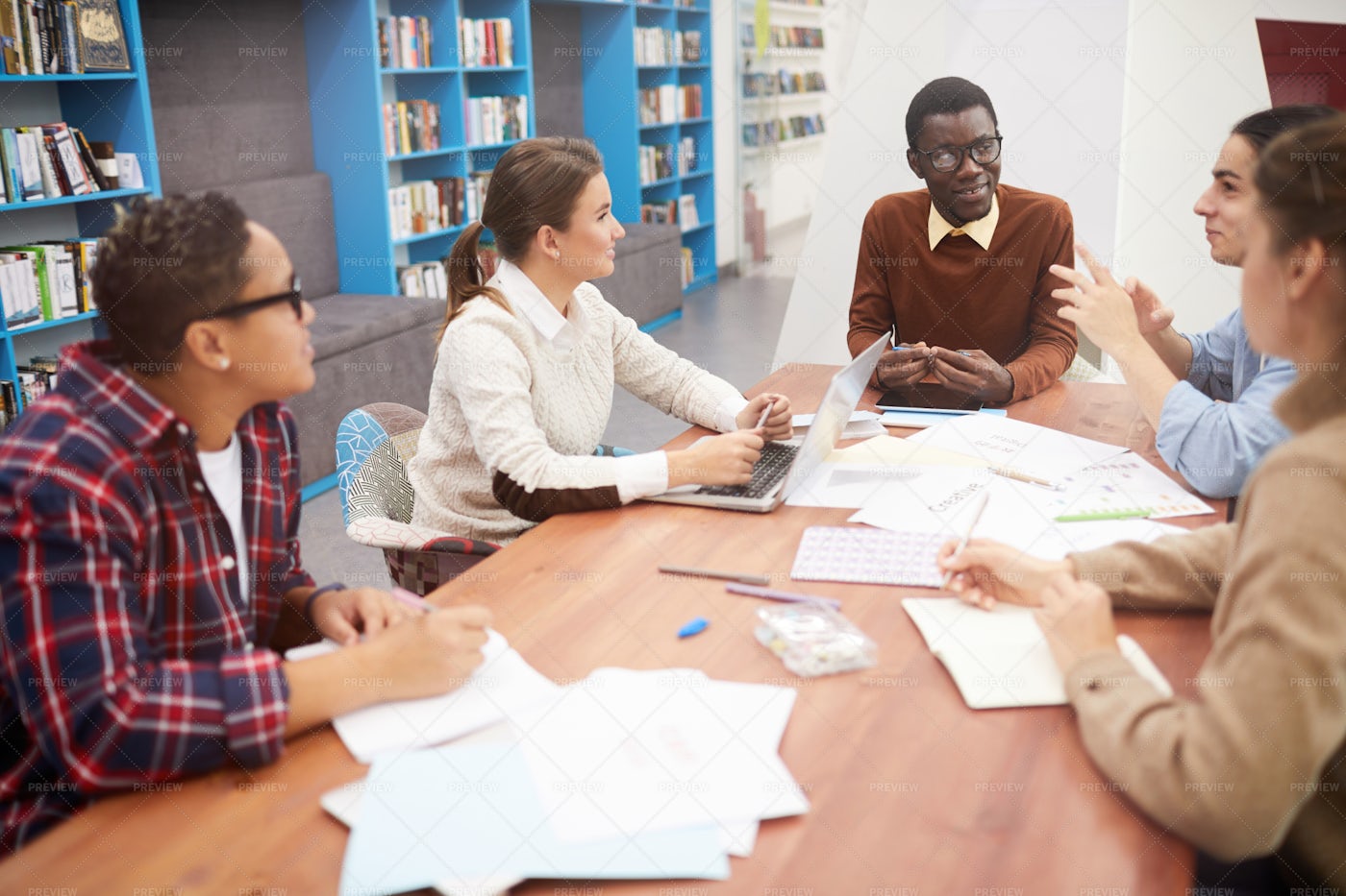Team Study In Library: Stock Photos