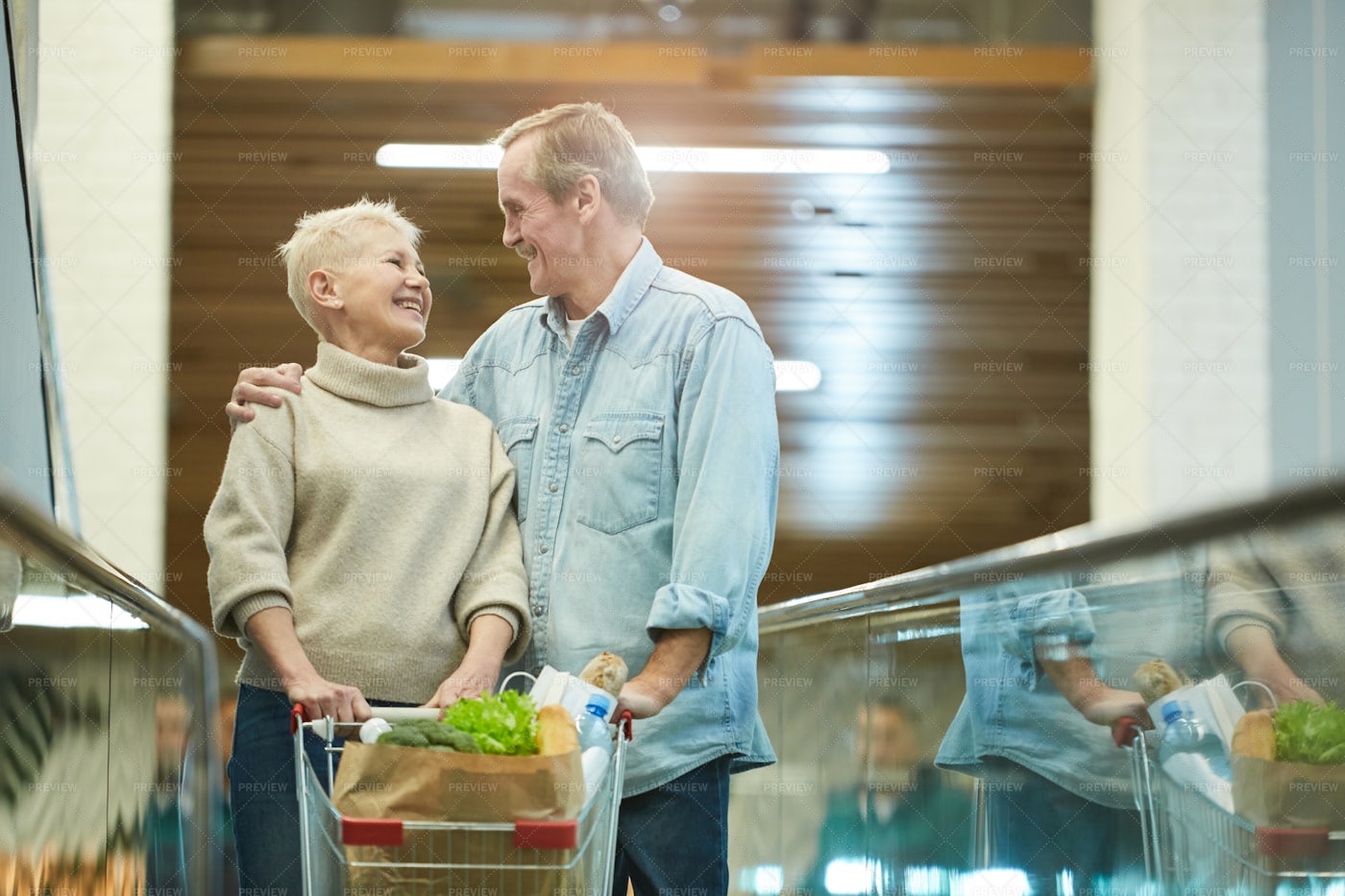 Smiling Senior Couple Shopping: Stock Photos