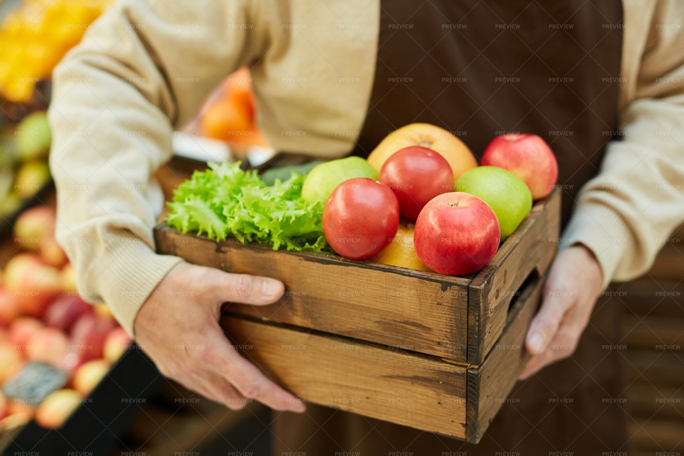 Holding Box Of Produce: Stock Photos