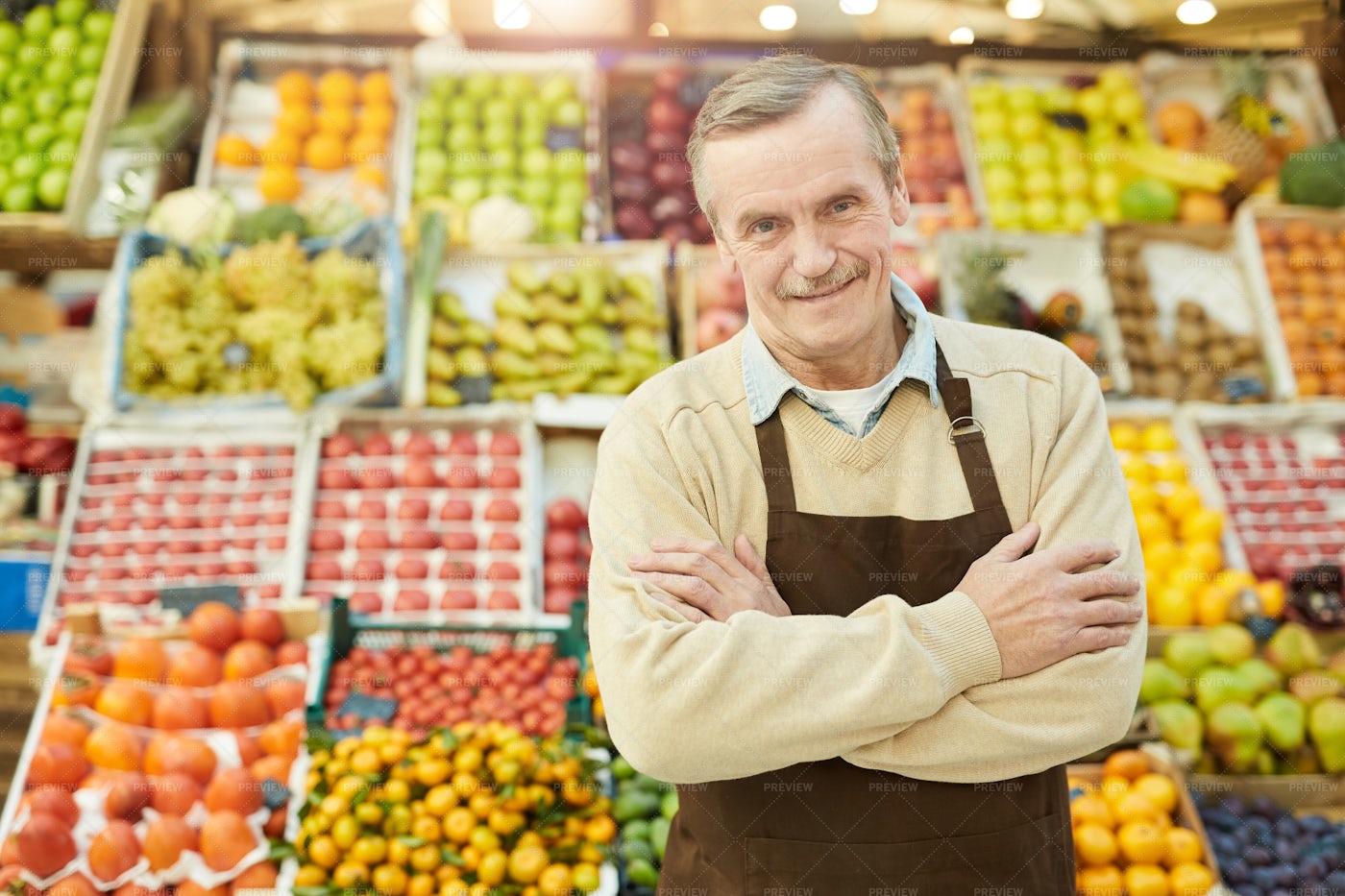 Smiling Senior Man Selling Fruit: Stock Photos