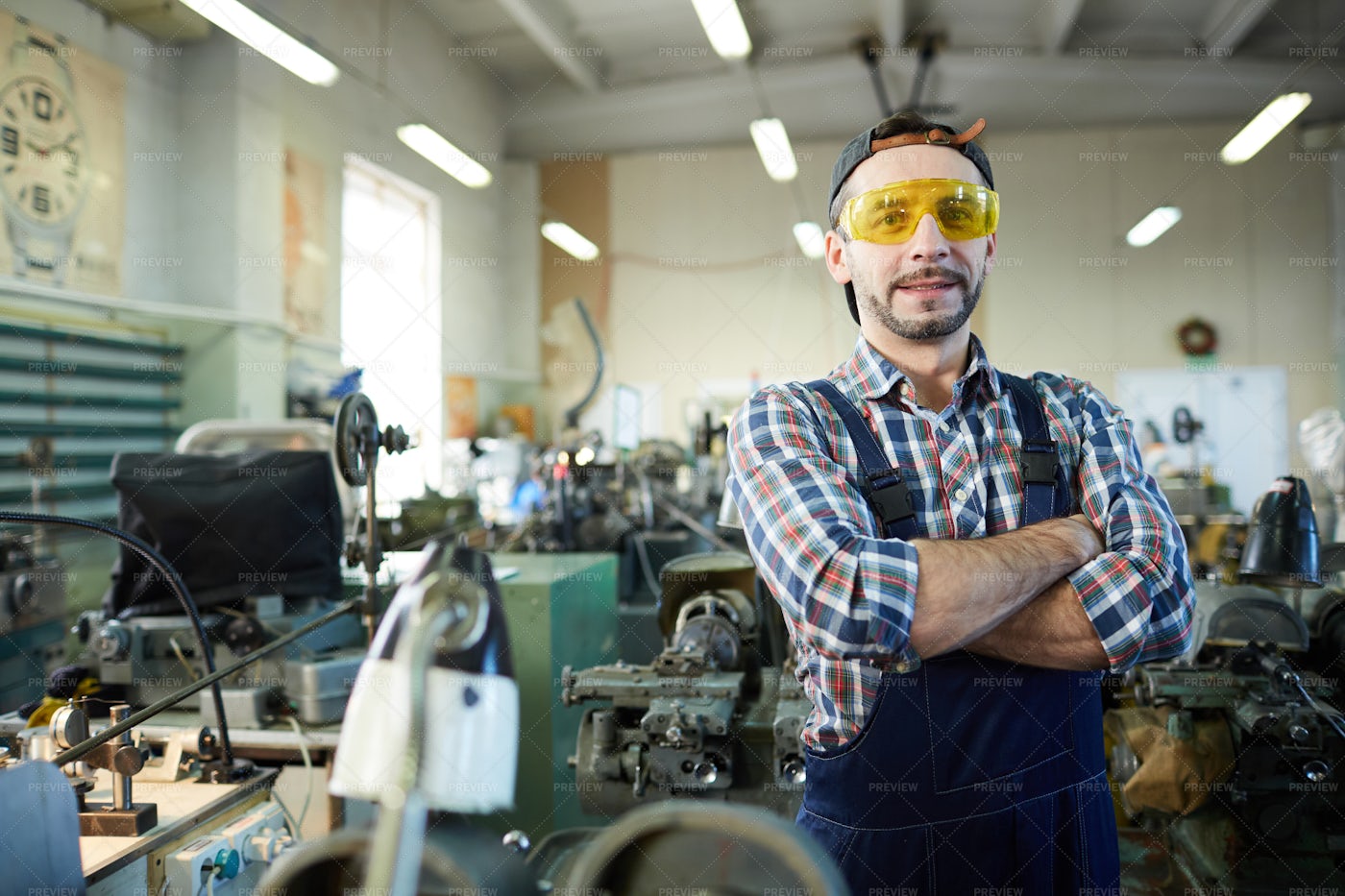 Mature Worker Posing At Industrial...: Stock Photos