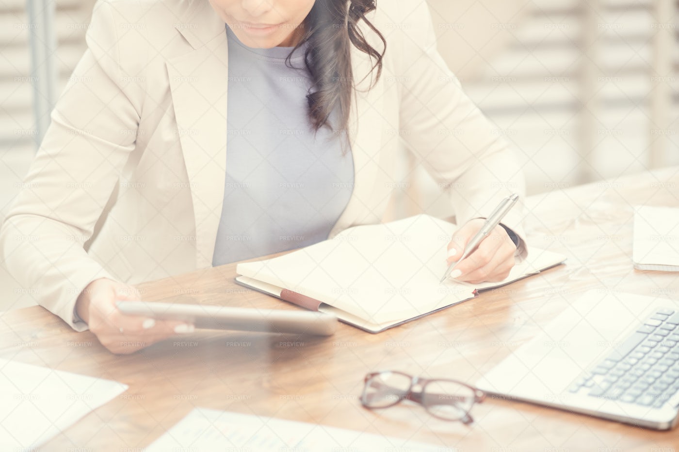 Mixed-Race Businesswoman At...: Stock Photos