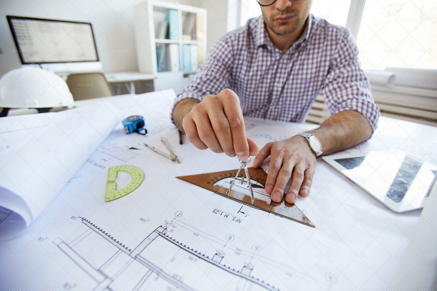 Engineer Drawing Plans Close Up: Stock Photos