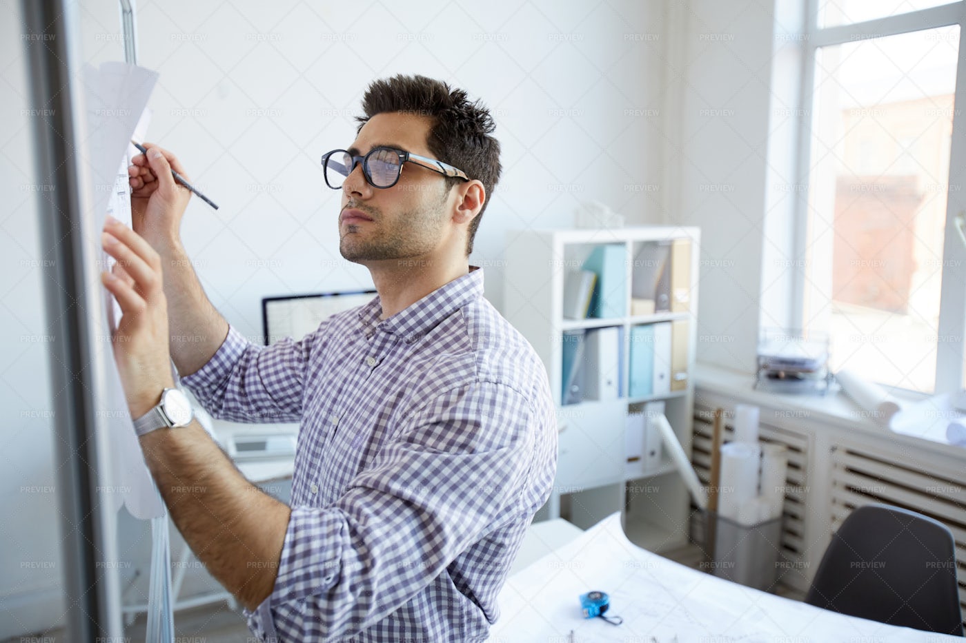 Engineer Planning Project In...: Stock Photos