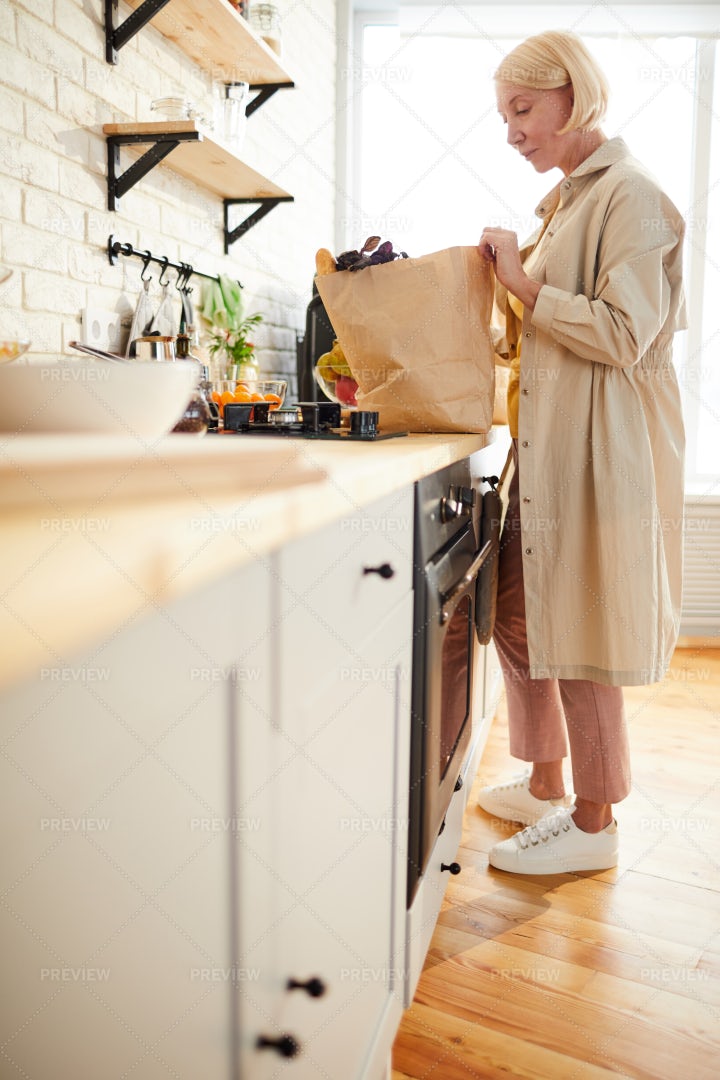 Blond Woman After Shopping In...: Stock Photos