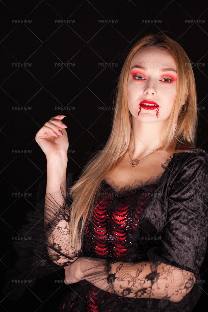 Vampire With Bloody Lips: Stock Photos