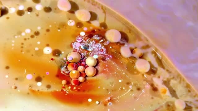 Colorful Ink Spheres On Oil 28: Stock Video