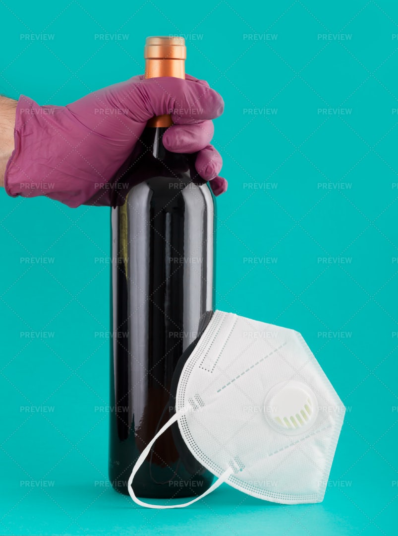 Wine Bottle And Protective Mask: Stock Photos