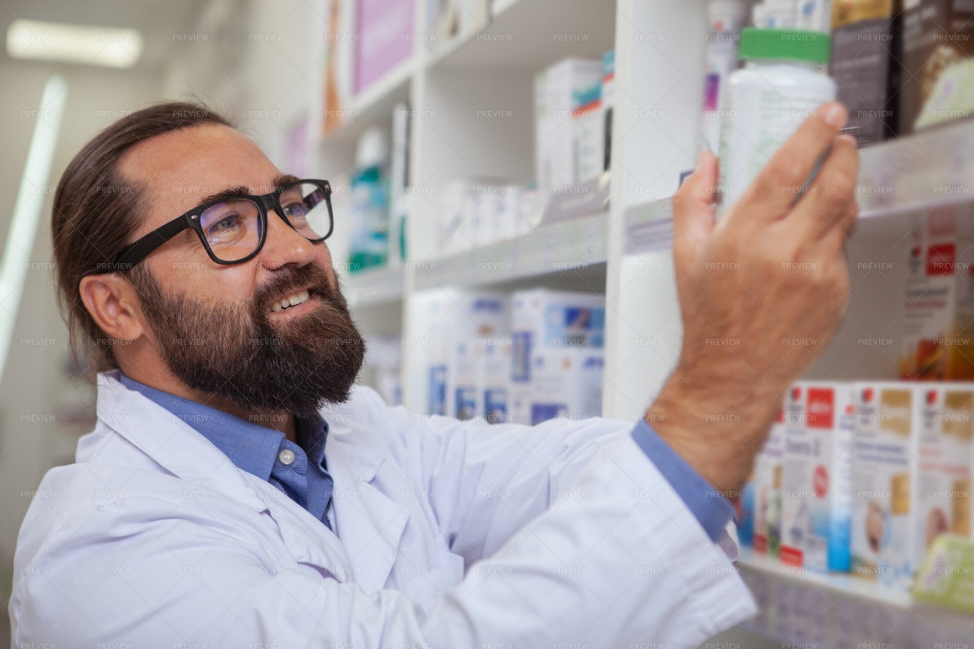 Taking Medication From The Shelf: Stock Photos