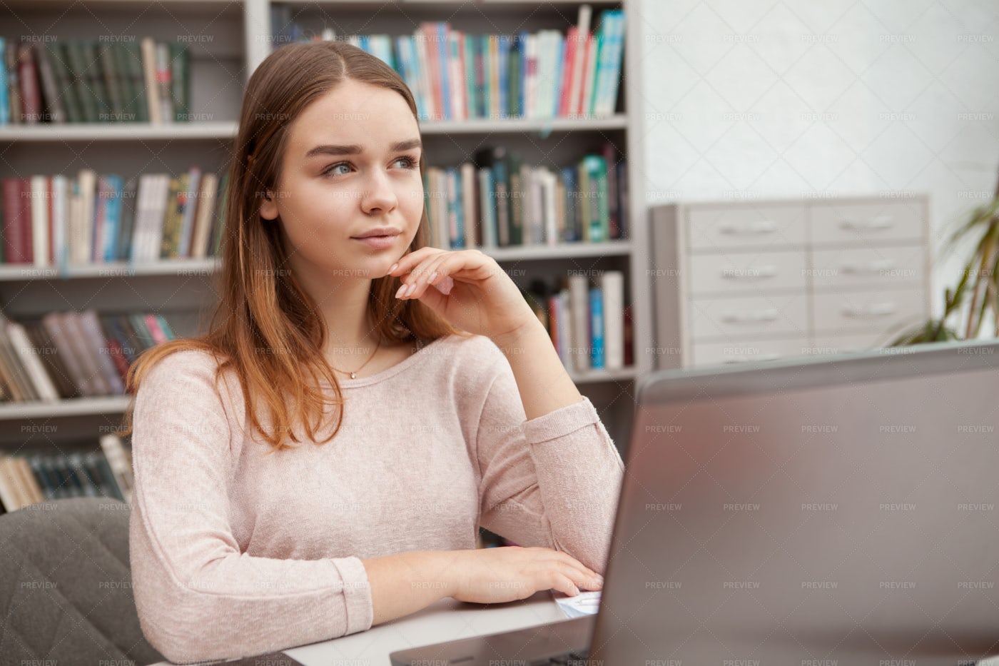 Studying At A Library: Stock Photos