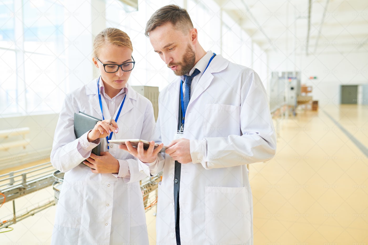 Factory Technologists Using Digital...: Stock Photos