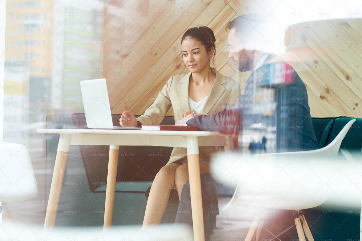 Young Businesswoman Working Behind...: Stock Photos