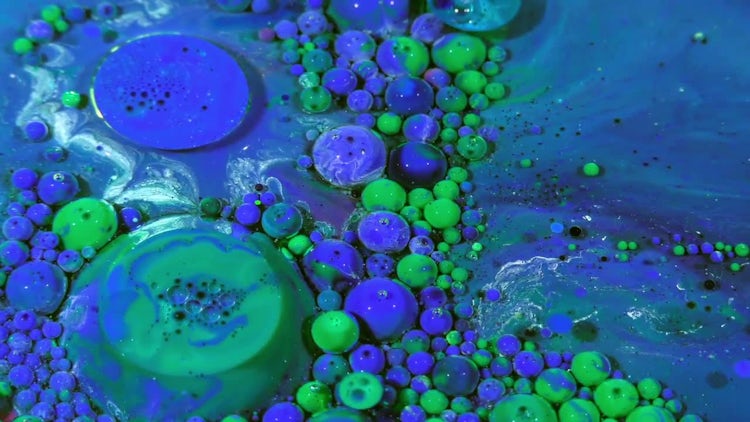 Colorful Ink Spheres On Oil 33: Stock Video