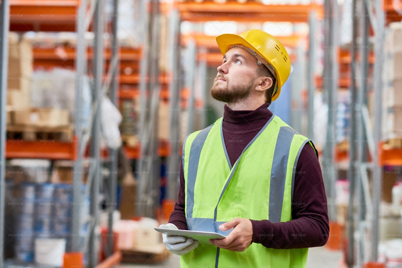 Warehouse Worker Using Digital...: Stock Photos