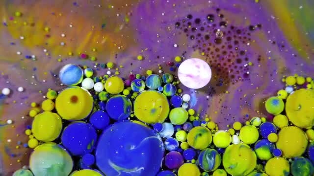 Colorful Ink Spheres On Oil 42: Stock Video