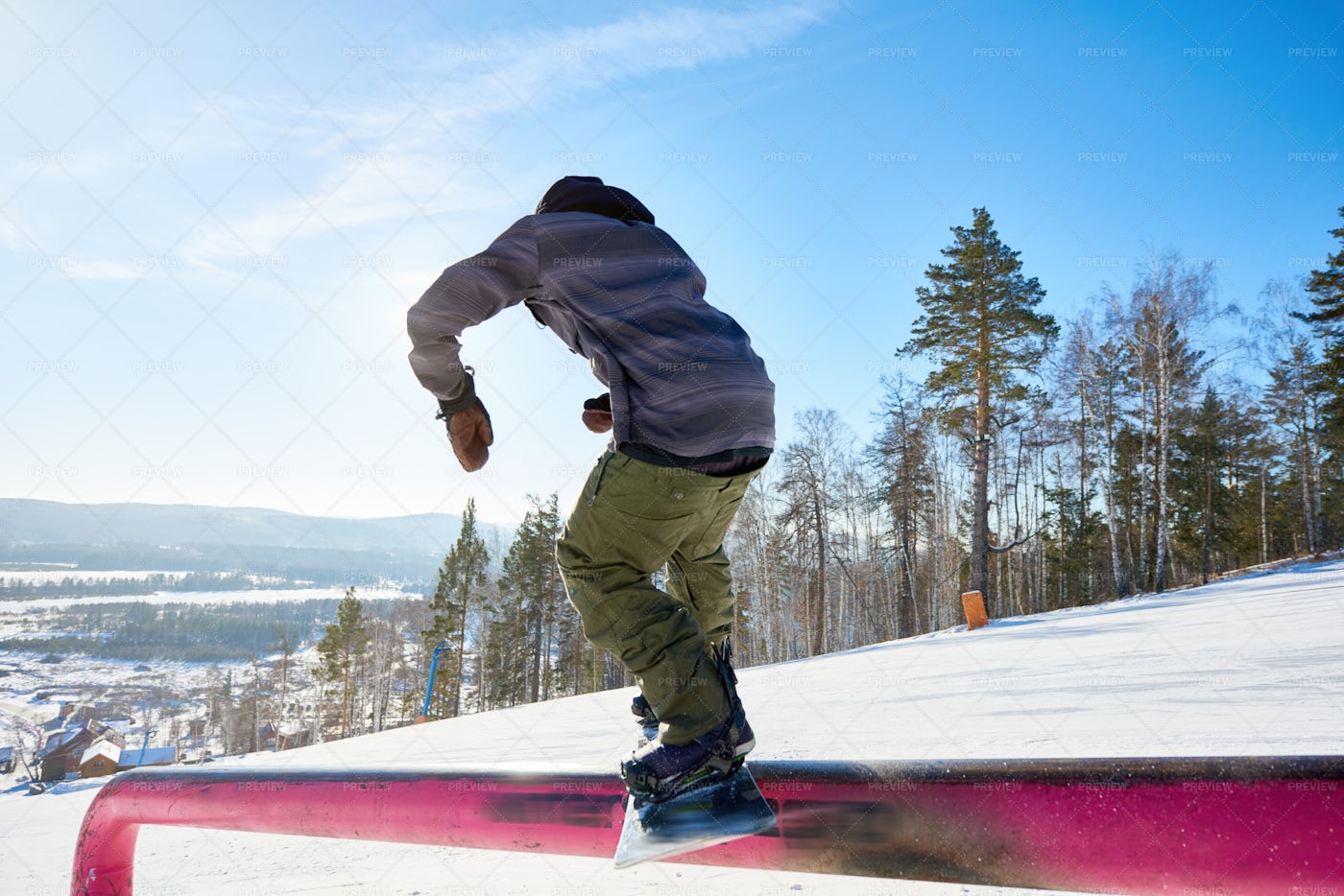 Snowboarder Riding On Rail: Stock Photos