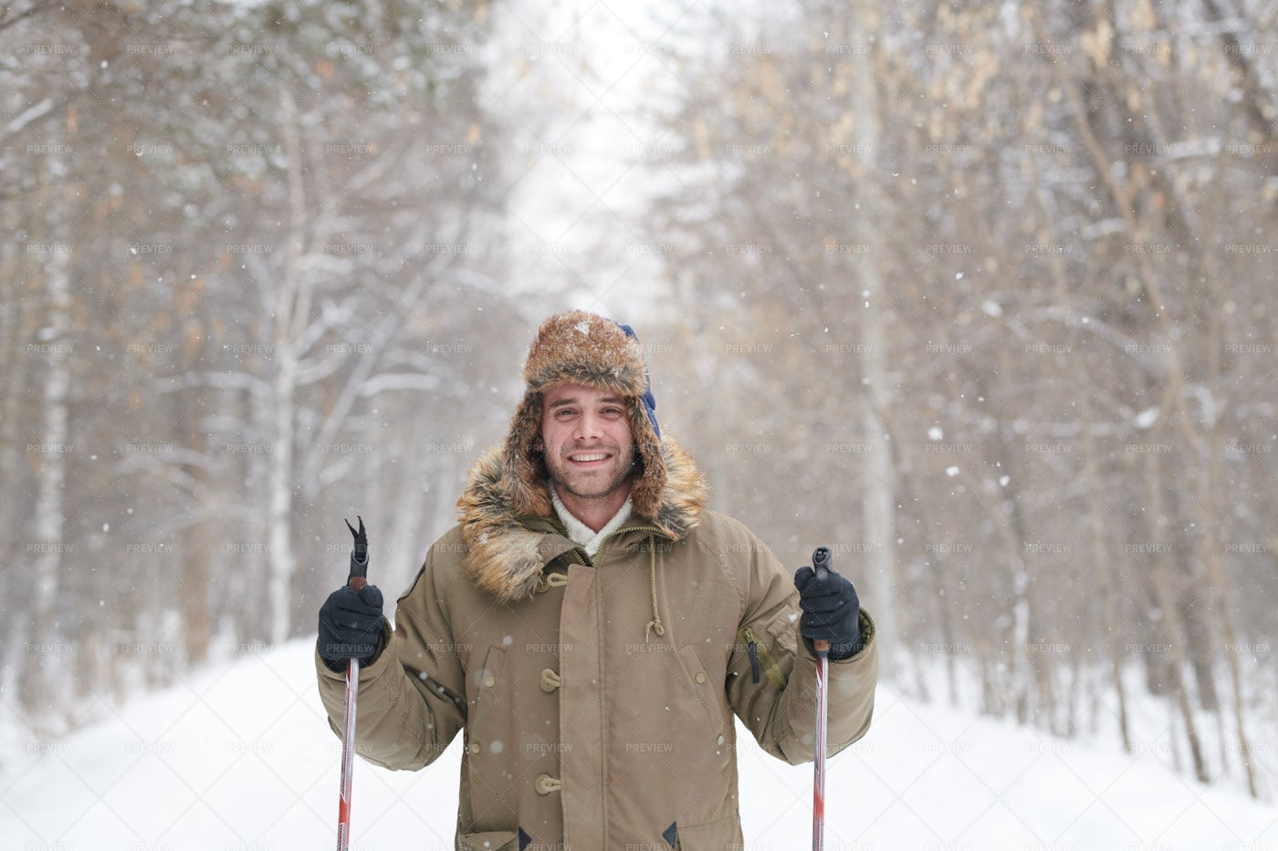 Happy Young Man Skiing: Stock Photos