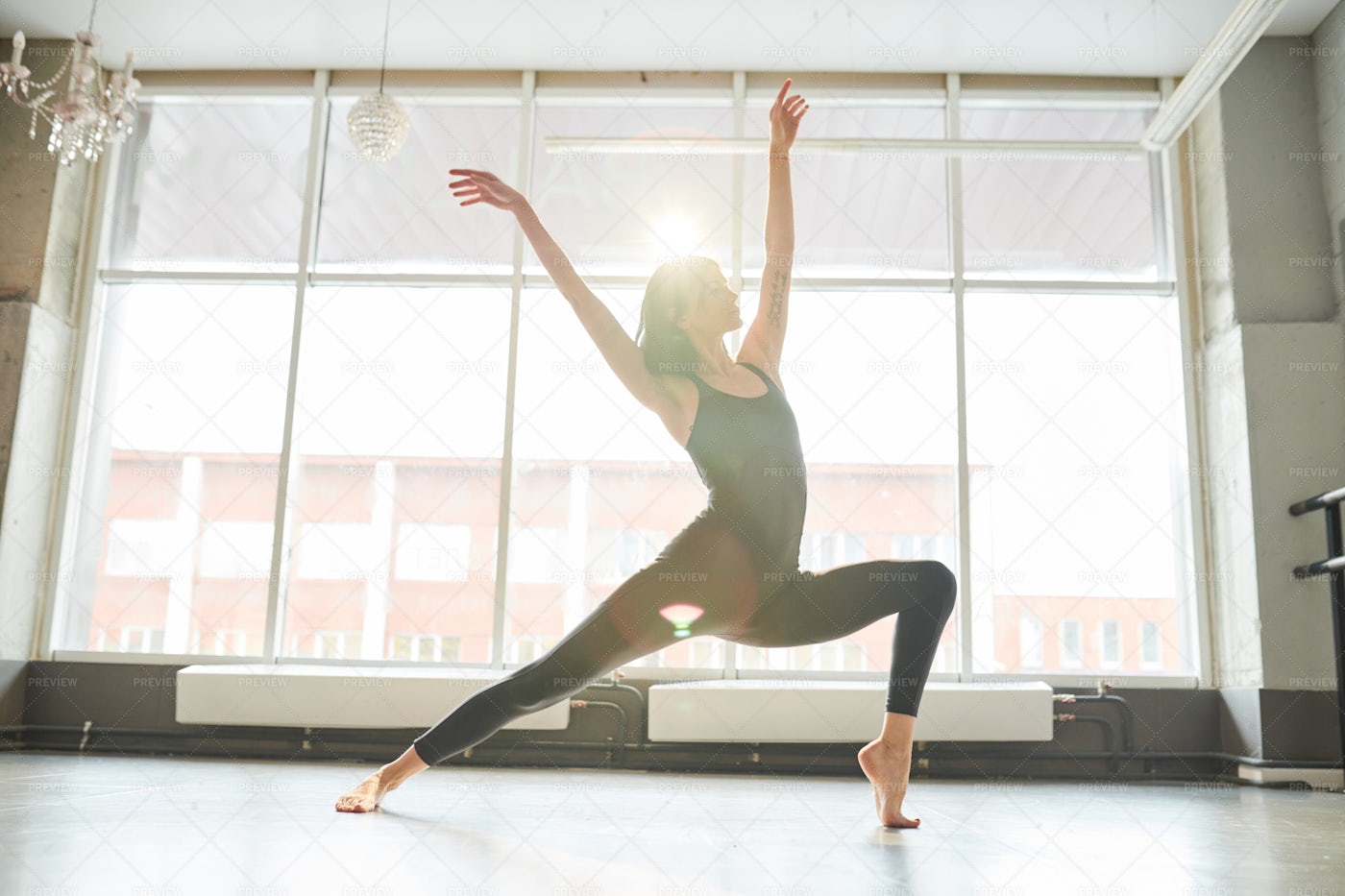Woman Dancing In Sunlight: Stock Photos