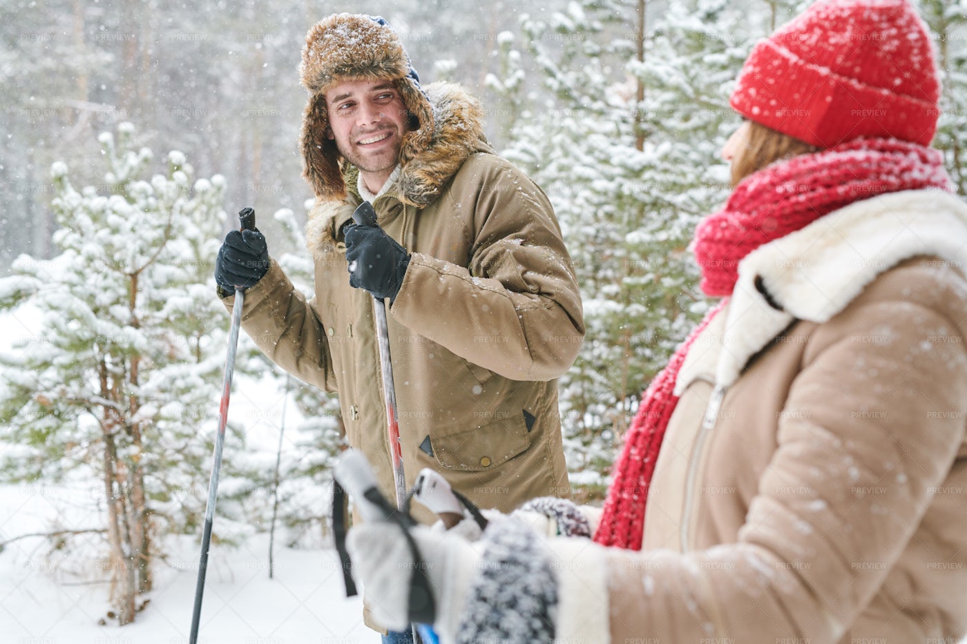 Happy Couple Skiing In Forest: Stock Photos