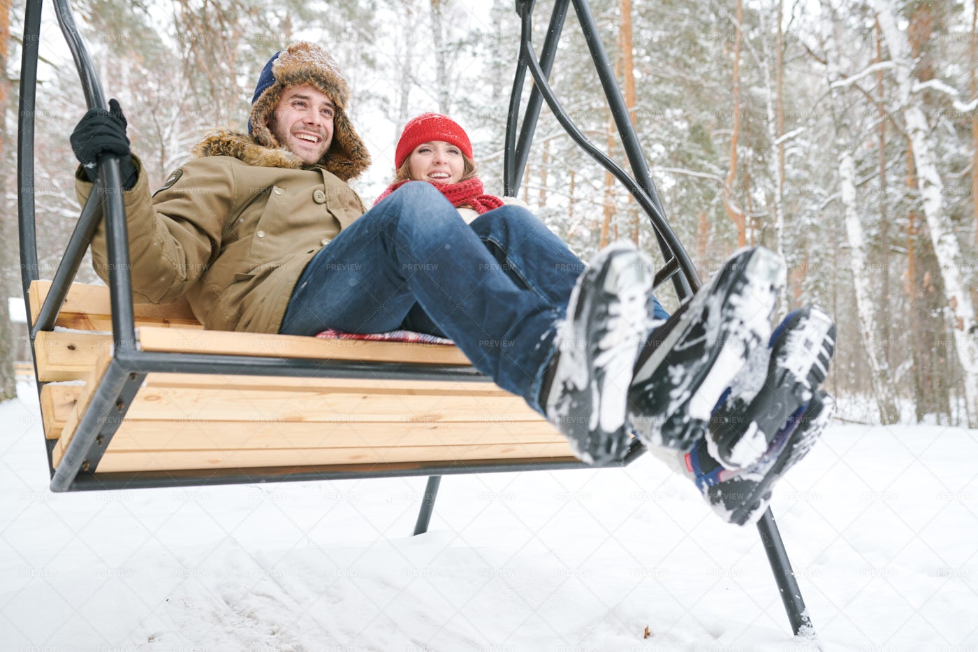 Couple On Wooden Swing: Stock Photos