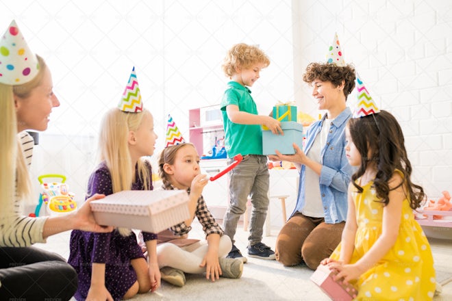 Cute Boy Giving Gift Boxes To... - Stock Photos | Motion Array