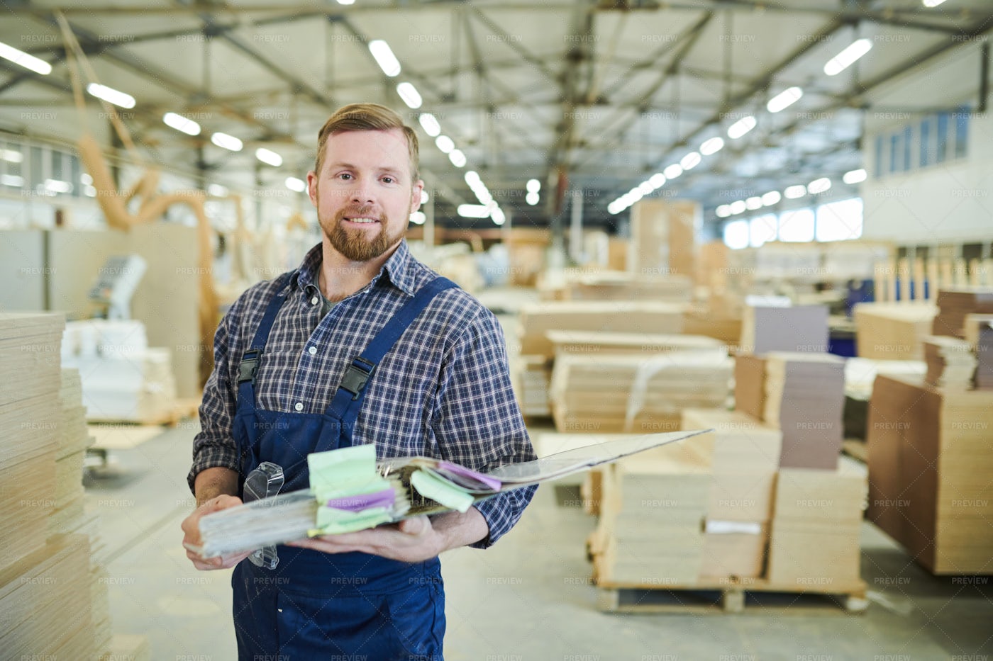 Smiling Factory Inspector Holding...: Stock Photos