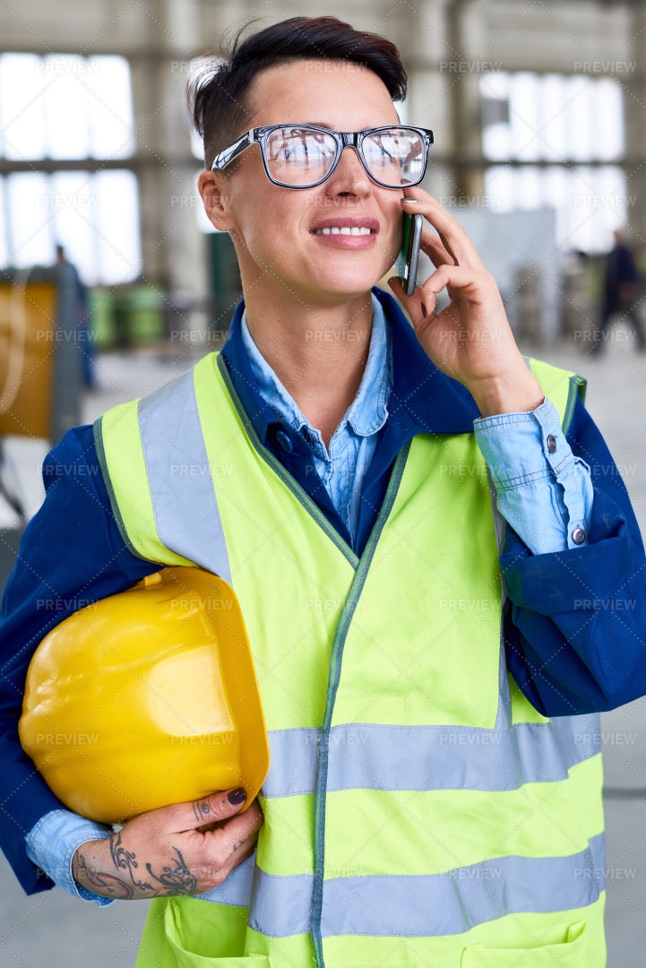 Modern Woman Speaking By Phone At...: Stock Photos