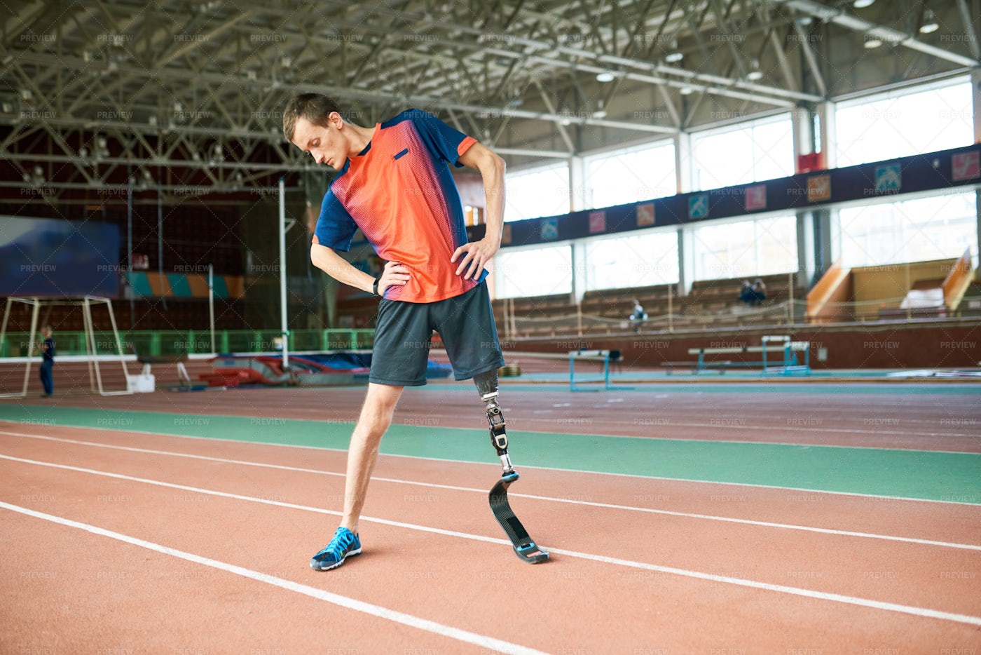 Adaptive Sportsman Warming Up: Stock Photos
