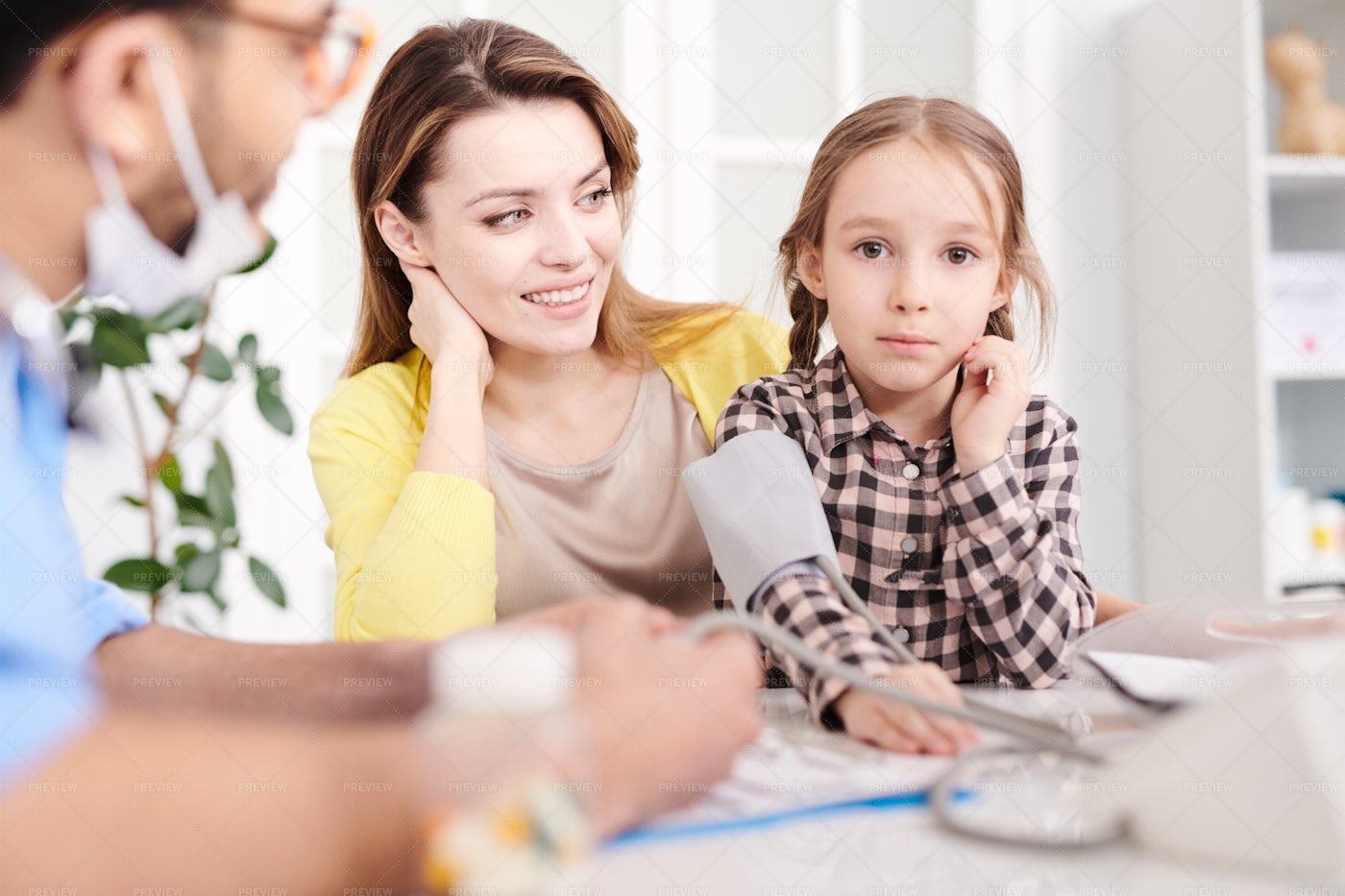 Cute Little Girl Visiting Doctor: Stock Photos