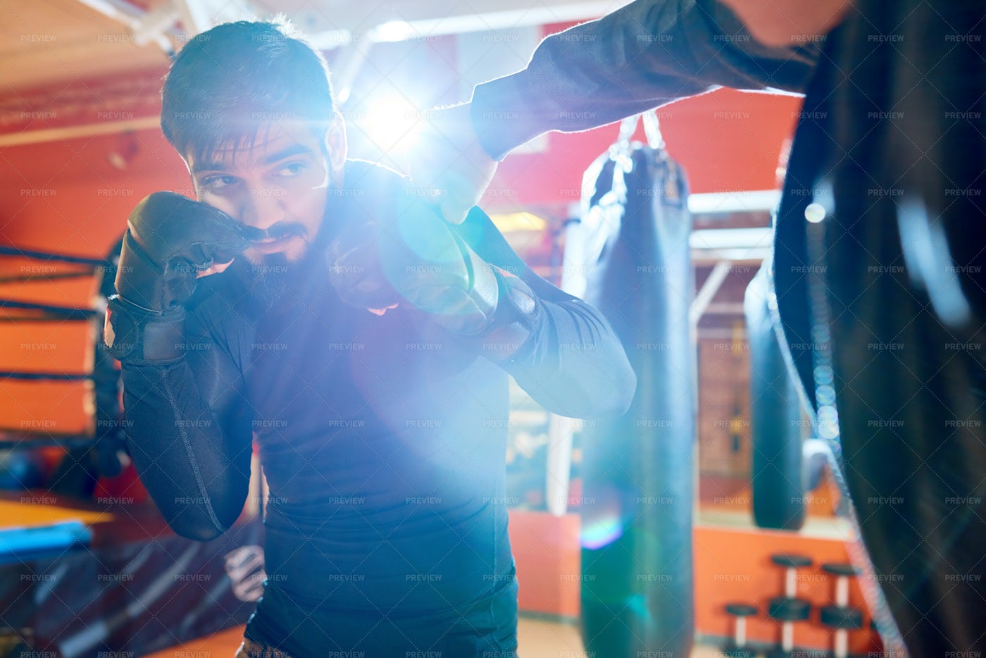 Trainer And Boxer In Sparring: Stock Photos