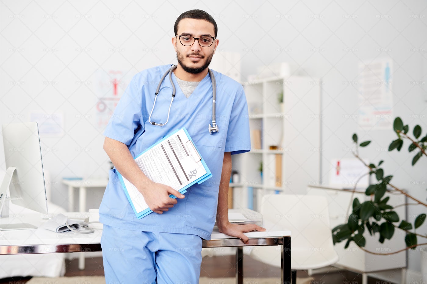 Middle-Eastern Physician Posing In...: Stock Photos