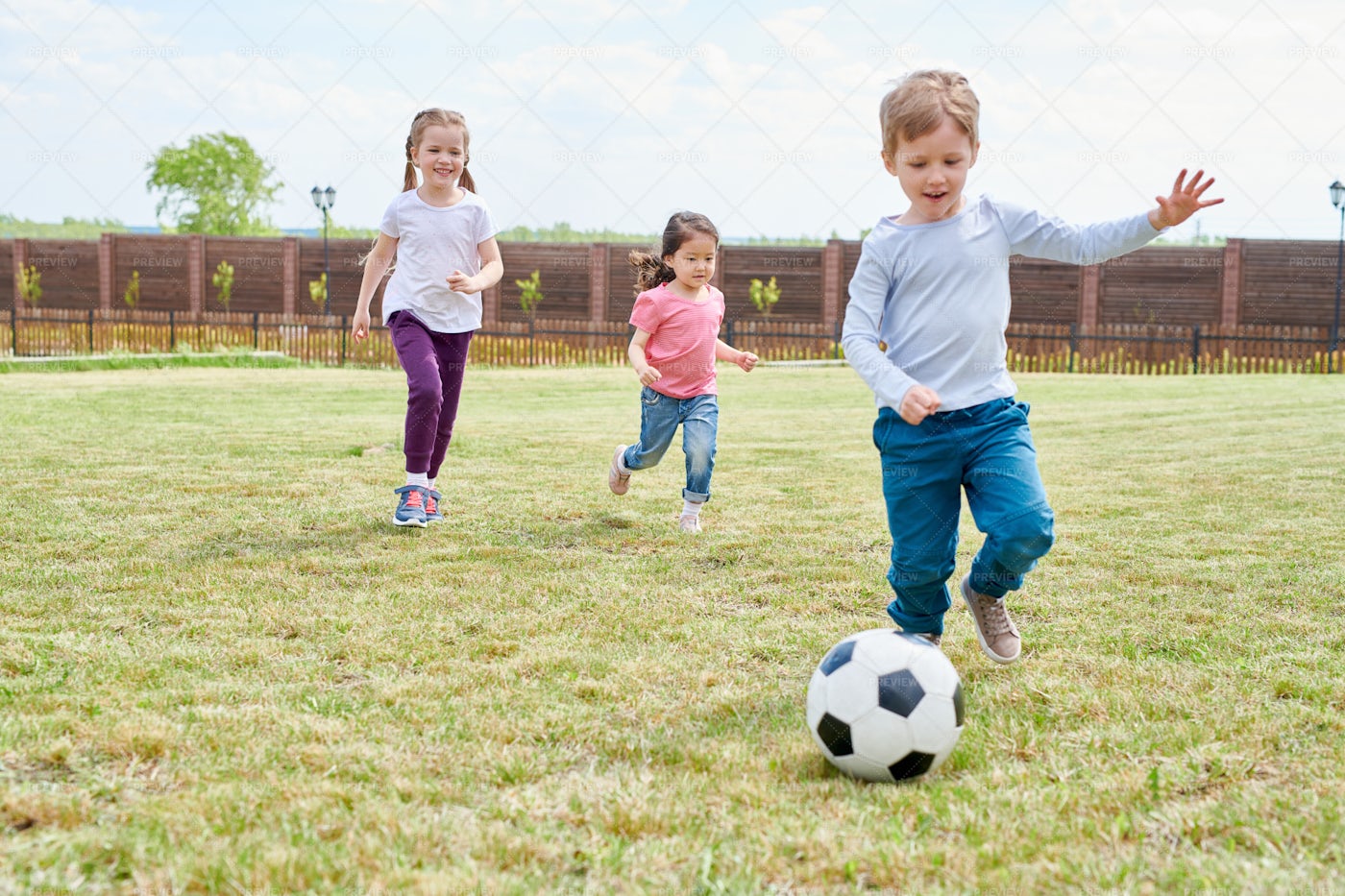 Kids Playing Football - Stock Photos | Motion Array