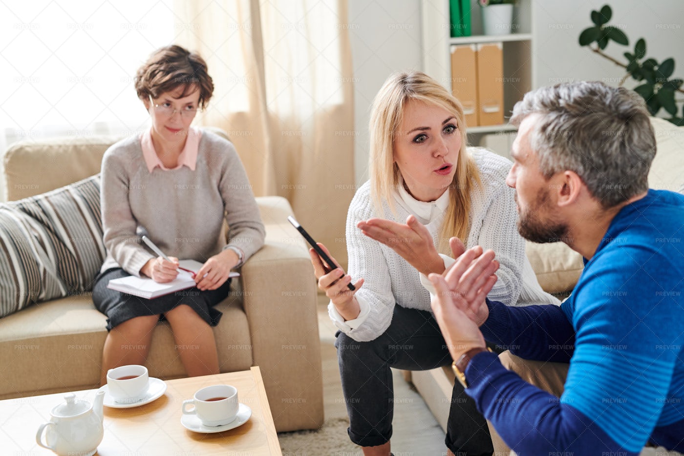 Sad Wife Fighting With Cheating...: Stock Photos
